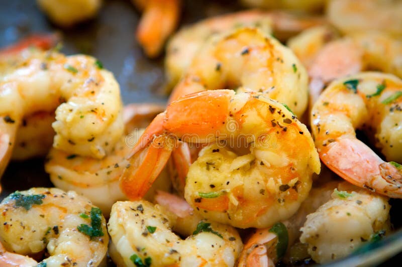 An image of decadent sauteed seasoned shrimp. An image of decadent sauteed seasoned shrimp