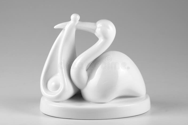 Porcelain model of a stalk carrying a newborn baby. Porcelain model of a stalk carrying a newborn baby