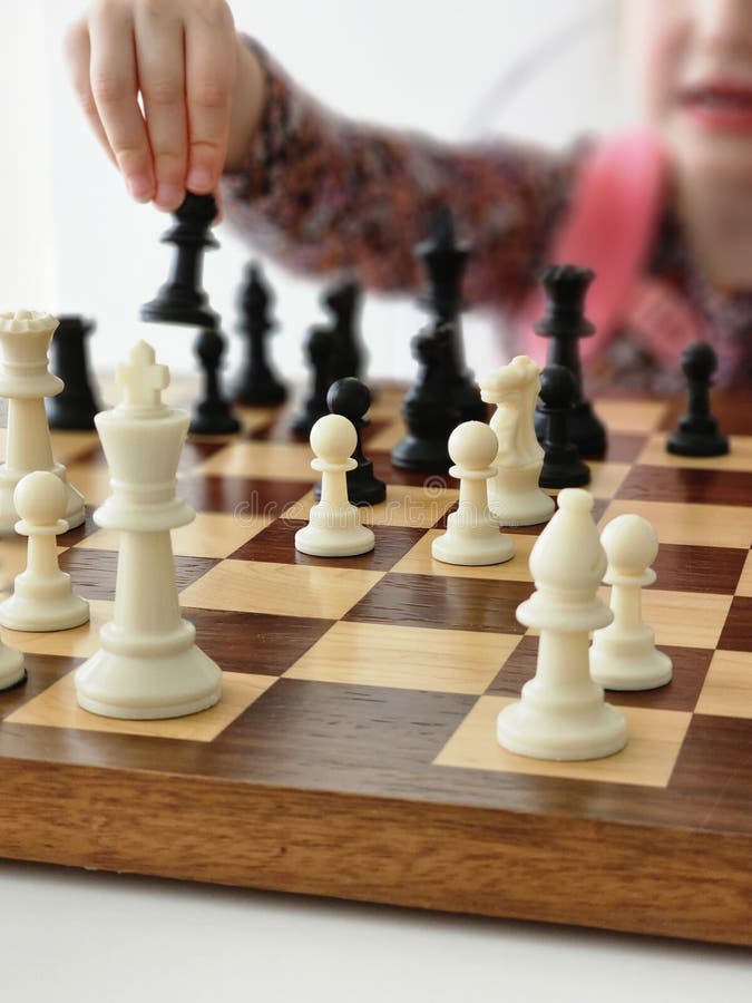 A Game on a Chess Board with Black and White Pieces Stock Image Image