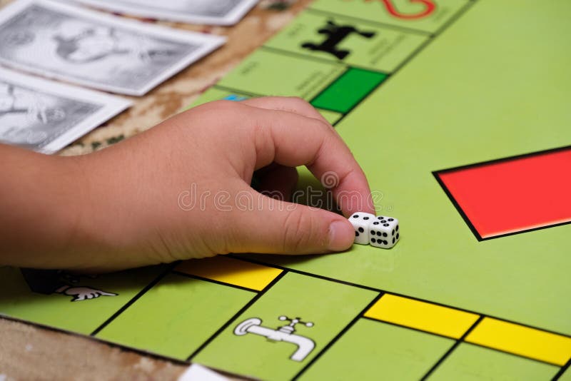 Game Monopoly, Game Chips and Dice on the Table Stock Photo Image of financial, bone 255302168