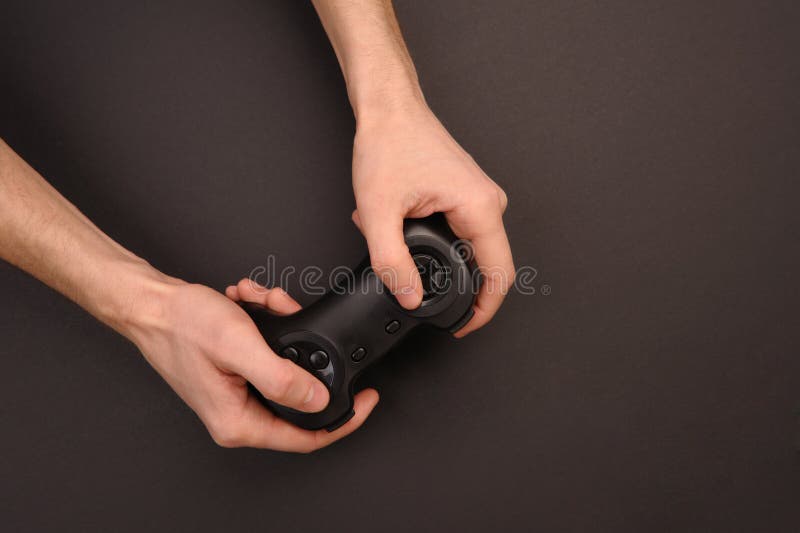 Gamepad in hands. royalty free stock image