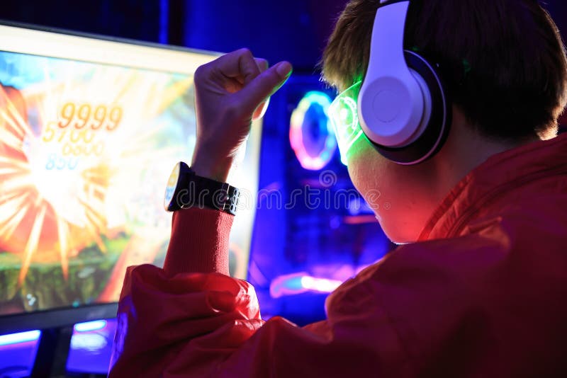 Gamer Playing Online Game on PC in Dark Room Stock Photo - Image of online,  colorful: 213130418