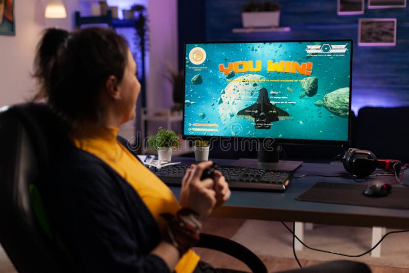 Free Photo  Adult using keyboard and mousepad to play video games on  computer. gamer playing online game in front of monitor with control  console and mouse on desk. modern player with