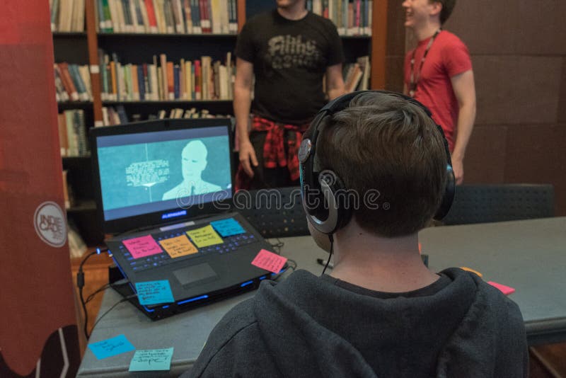 Gamers playing demo video games during the IndieCade stock photos Gamers playing demo video games during the IndieCade stock photos