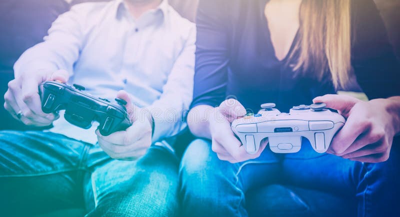 Free Photo  Person playing video games with controller on computer. player  using joystick and wearing headphones to play online game on monitor.  modern man using gaming equipment to have fun.