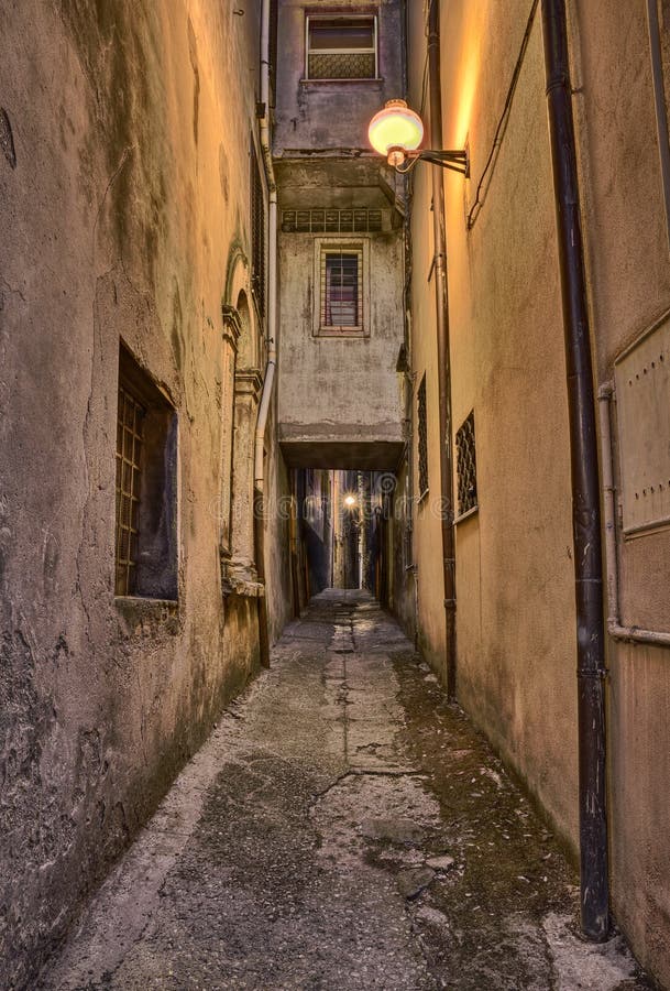 Picturesque old narrow alley at night in the medieval town Guardiagrele, Abruzzo, Italy. Picturesque old narrow alley at night in the medieval town Guardiagrele, Abruzzo, Italy