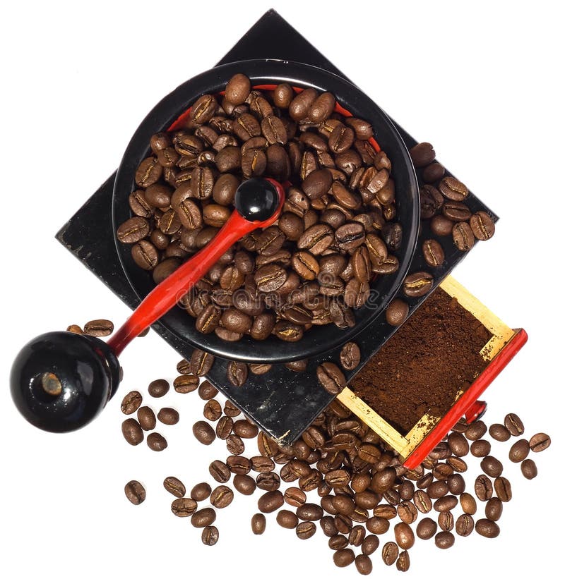 Gammal kaffekvarn under det malande kaffet arkivfoton Gammal kaffekvarn under det malande kaffet arkivfoton