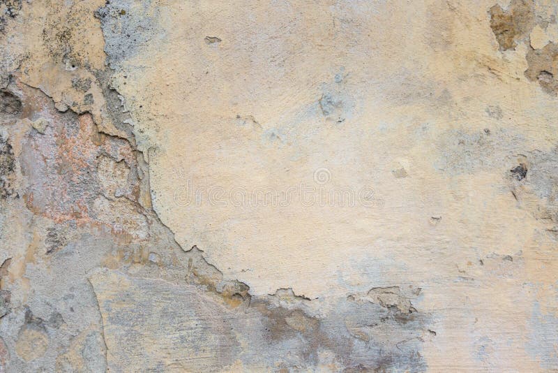 Old Plaster Wall With Peel Grey Stucco Texture Background. Decayed Cracked Rough Abstract Surface. Old Plaster Wall With Peel Grey Stucco Texture Background. Decayed Cracked Rough Abstract Surface