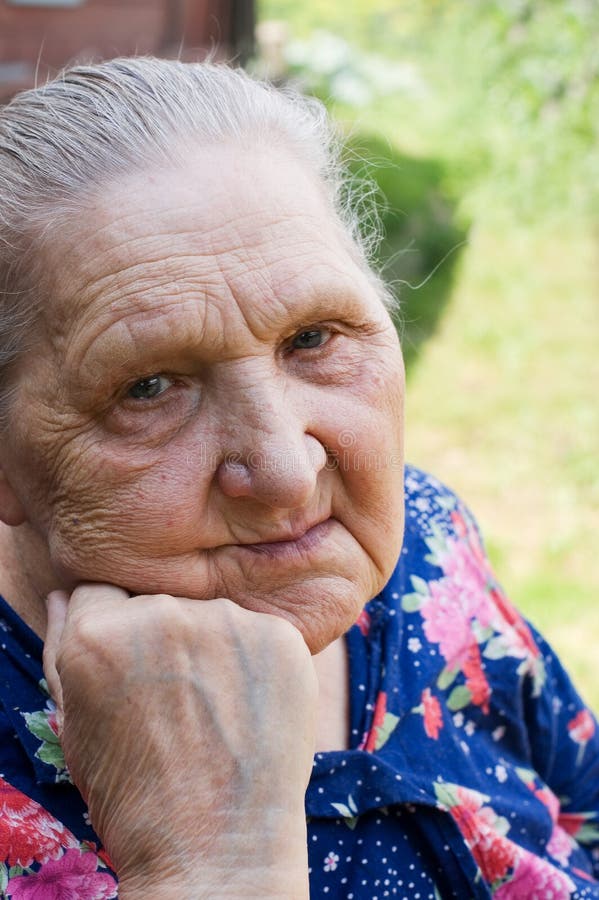 Portrait of the old woman outdoor. Portrait of the old woman outdoor