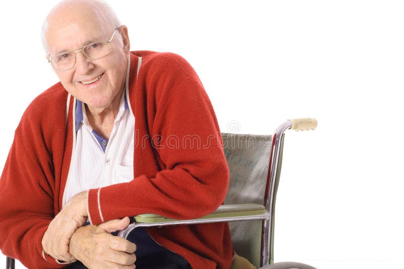 gammalare lycklig manrullstol royaltyfri fotografi gammalare lycklig manrullstol royaltyfri fotografi