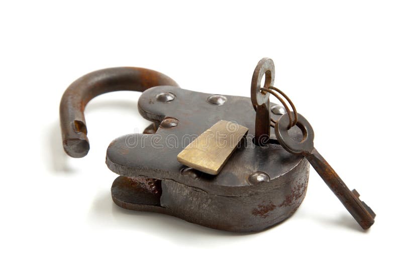 An old, antique vintage lock with keys on a white background. An old, antique vintage lock with keys on a white background