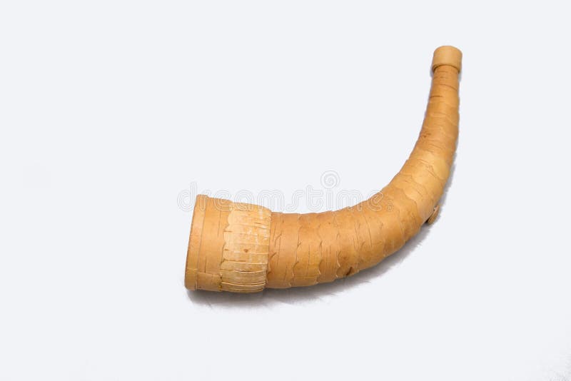 Old Russian Horn of birch bark. Hunting horn made from birch bark - imitates the sound of an elk. Old Russian Horn of birch bark. Hunting horn made from birch bark - imitates the sound of an elk