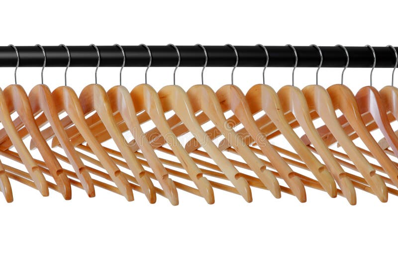 Ganci di cappotto di legno sulla guida immagine stock Ganci di cappotto di legno sulla guida immagine stock