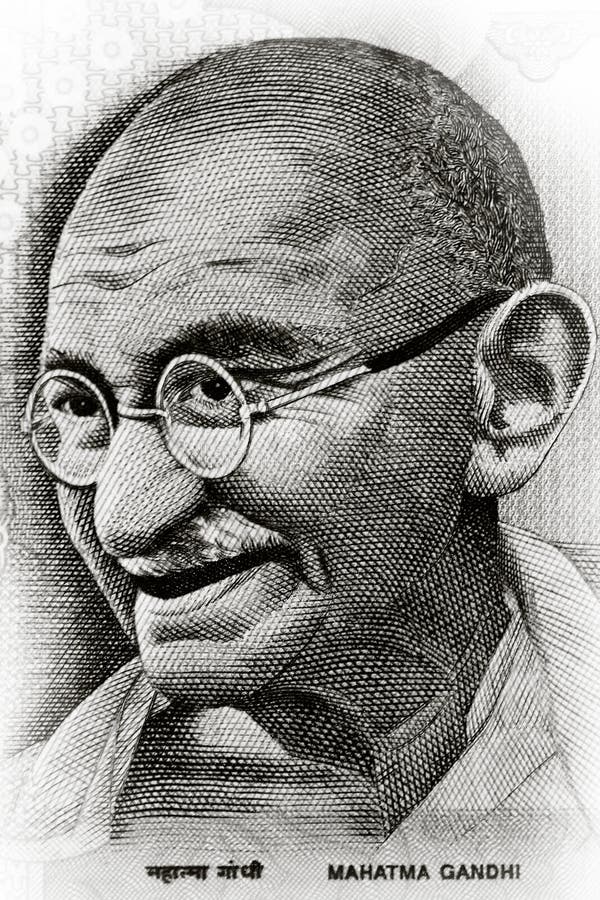 Close up shot of Gandhi on Indian rupee note