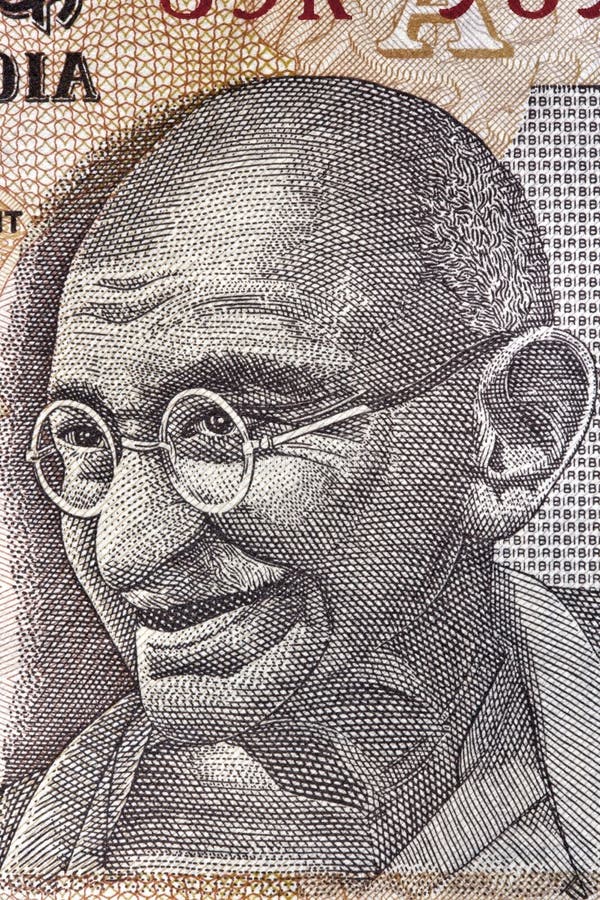 Portrait of Mahatma Gandhi on an Indian ten rupee note. Great detail. Portrait of Mahatma Gandhi on an Indian ten rupee note. Great detail.