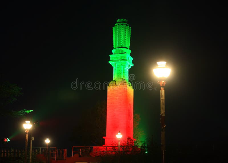 Illuminated Gandhi memorial pillar IN Vijayawada, India