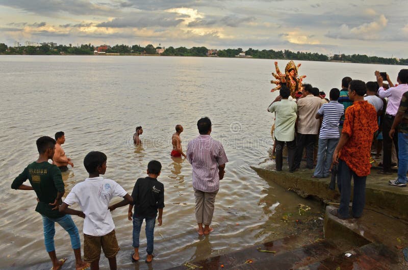 Ganges River In India. People gathered near the Ganges river at the time of immersion of goddess Durga in Bengal, India stock photo