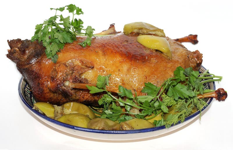 The traditional Christmas goose baked with apples. The traditional Christmas goose baked with apples