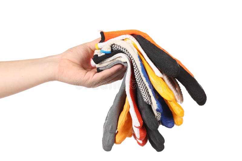 Gants en caoutchouc dans la pile sur une main photos stock Gants en caoutchouc dans la pile sur une main photos stock