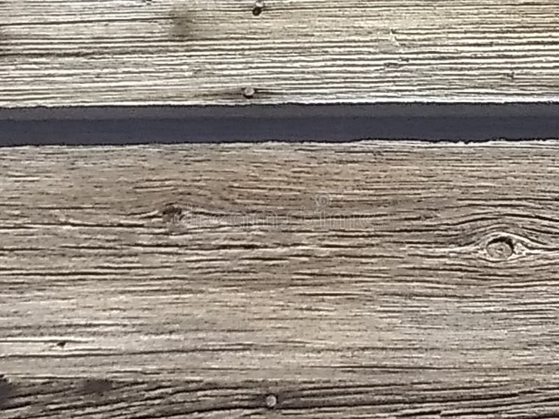 Wood plank board texture gaped at slightly above center the two planks meet. Wood plank board texture gaped at slightly above center the two planks meet