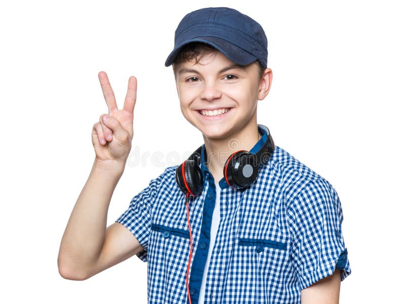 Adolescent garçon avec casquette et écouteurs image libre de droit