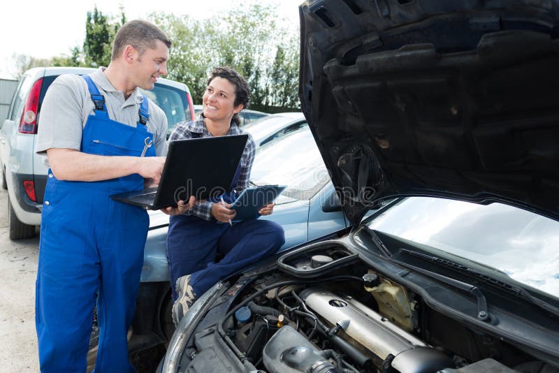 Garage Workers Working on Car Diagnostic Stock Image Image of duty