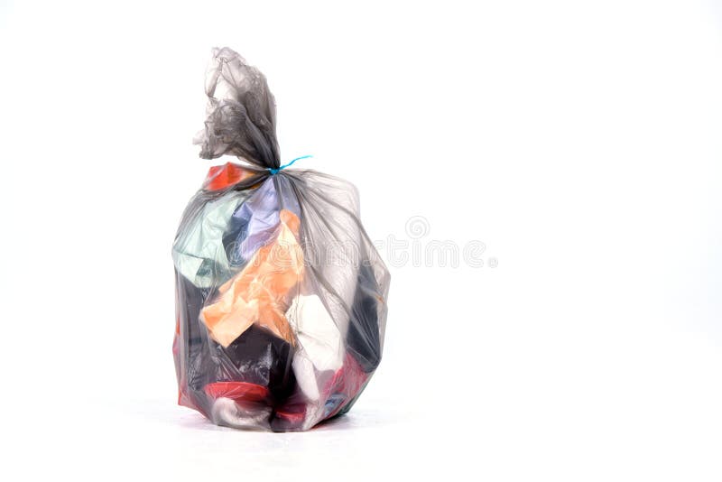 Garbage bag with defferent content in front of light background