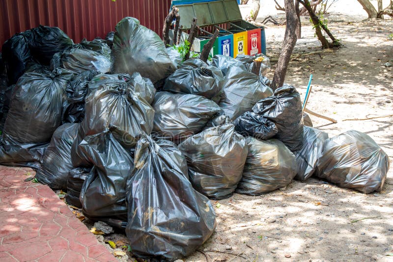 Garbage Bag or Trash in Plastic Black Bags. Stock Photo Image of