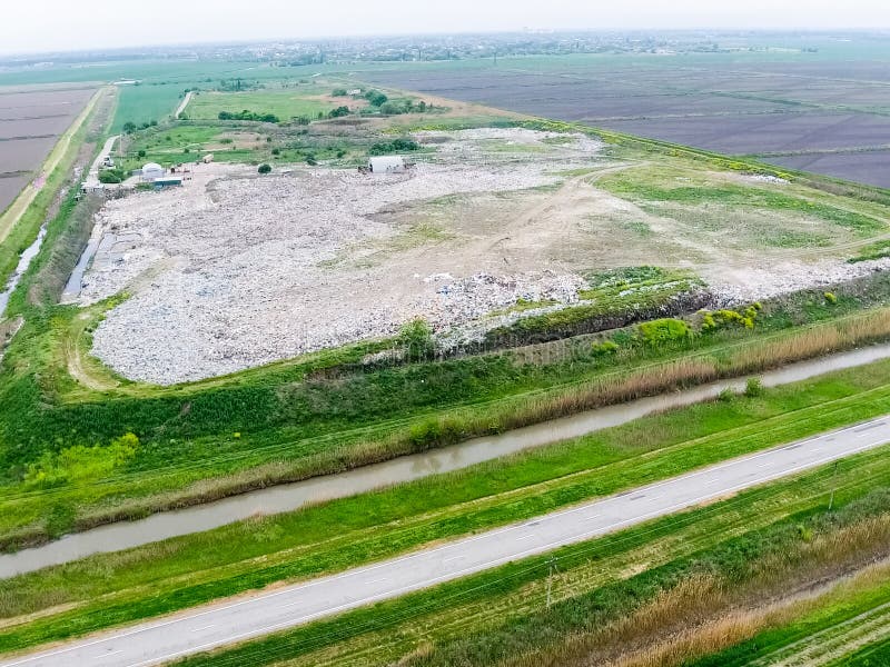 Dump with Heaps of Garbage and Treatment Facilities. Landfill of