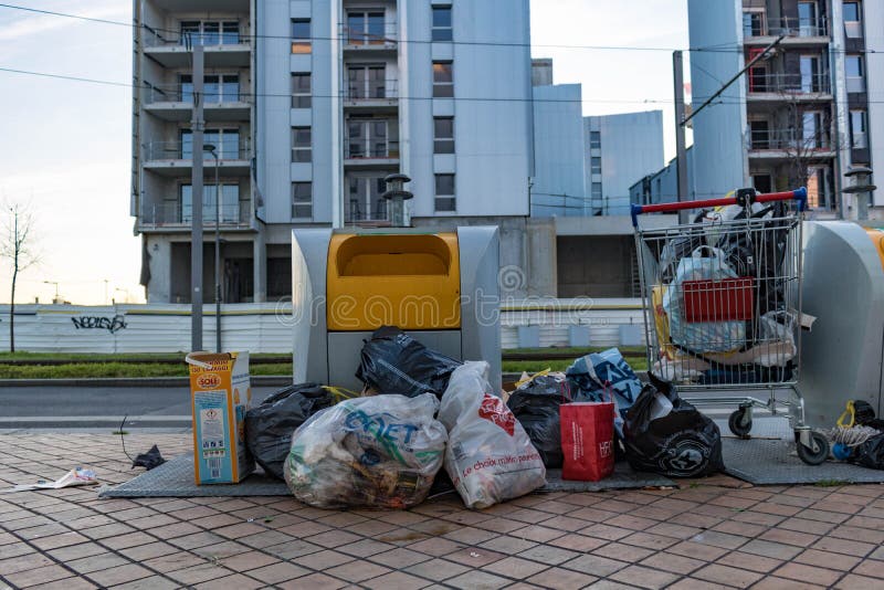 Garbage in the middle of the pavement, with an empty street royalty free stock image