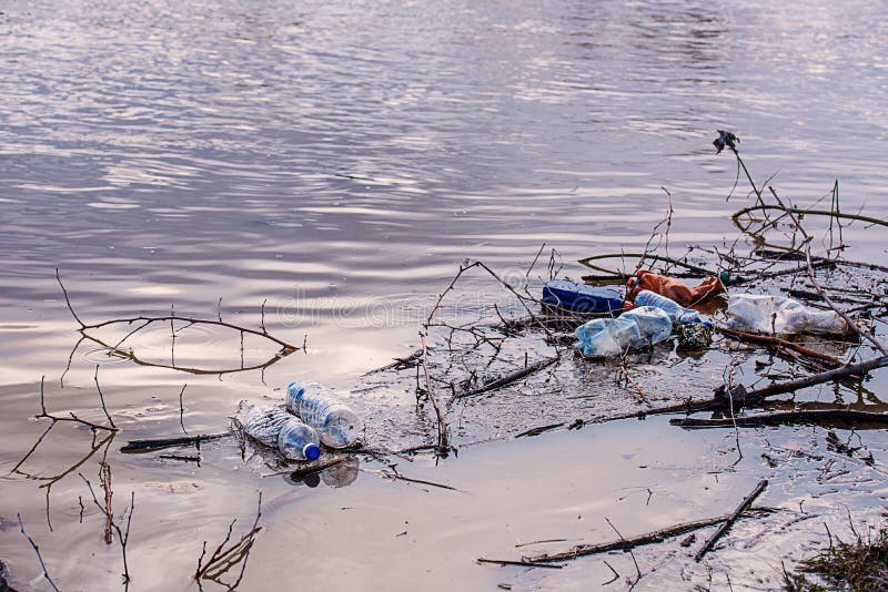 Garbage in the river stock photo. Image of catastrophe 167593754