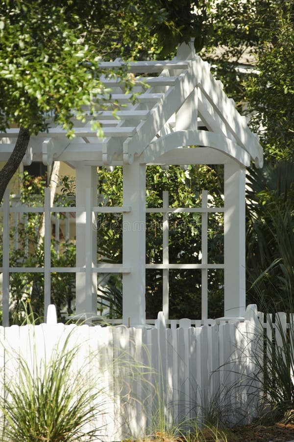 Garden arbor with trees. stock photo. Image of trellis 