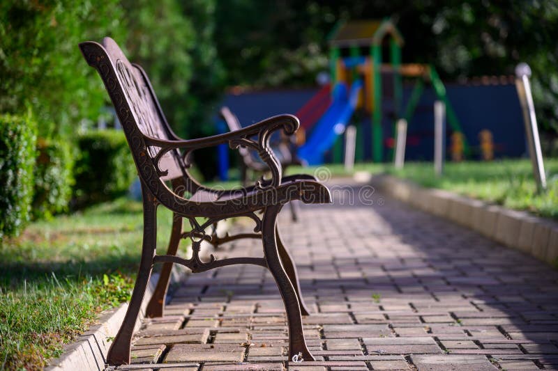 Brown Garden Bench for Resting Stock Image - Image of side, resting:  209415065