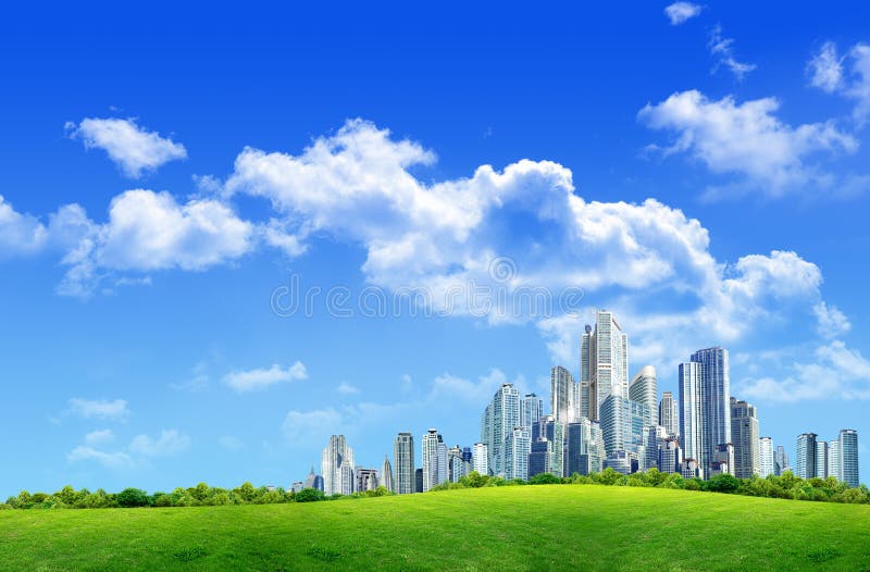 Garden and building towers with sky.