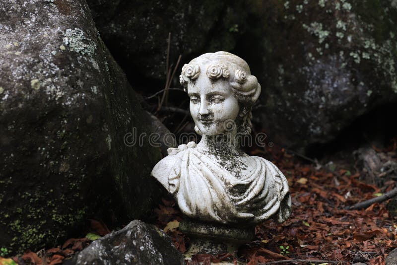 Garden sculpture.Bust of the ancient Greek goddess.