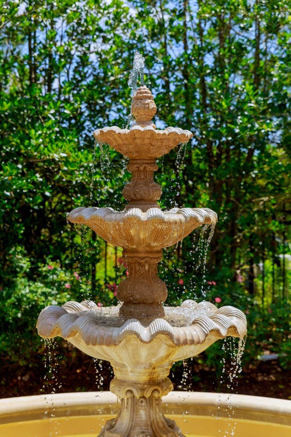Garden with small fountain stock image. Image of fountain 95850491