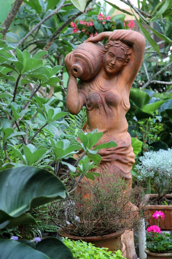 Female Sculpture in a Garden Stock Photo Image of landscaped, garden