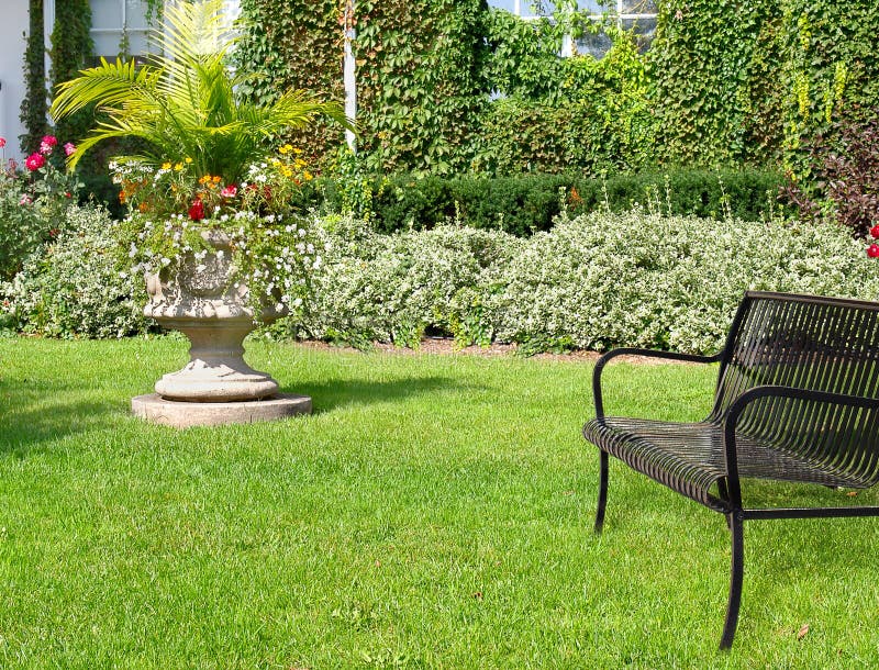 Garden in sunny day stock photography