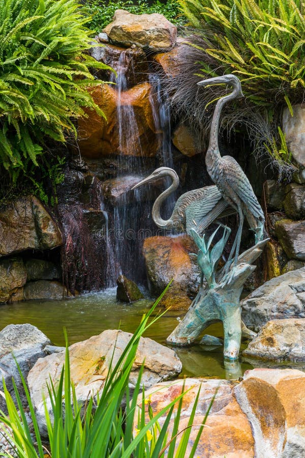 Garden Waterfall stock photo. Image of surrounded, pond 72358596