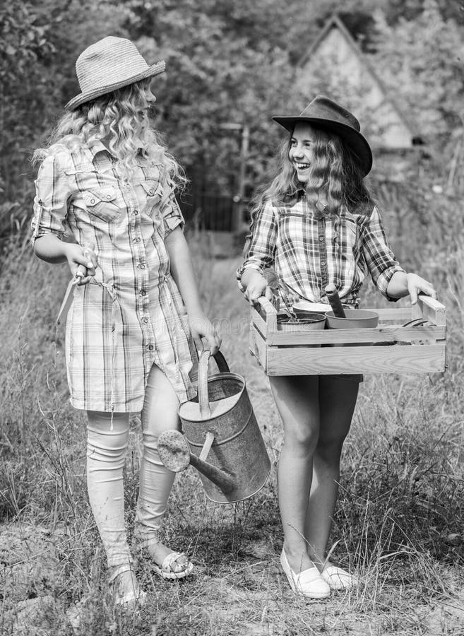 Gardener Occupation. Loving Nature. Taking Care Of Plants. Sisters