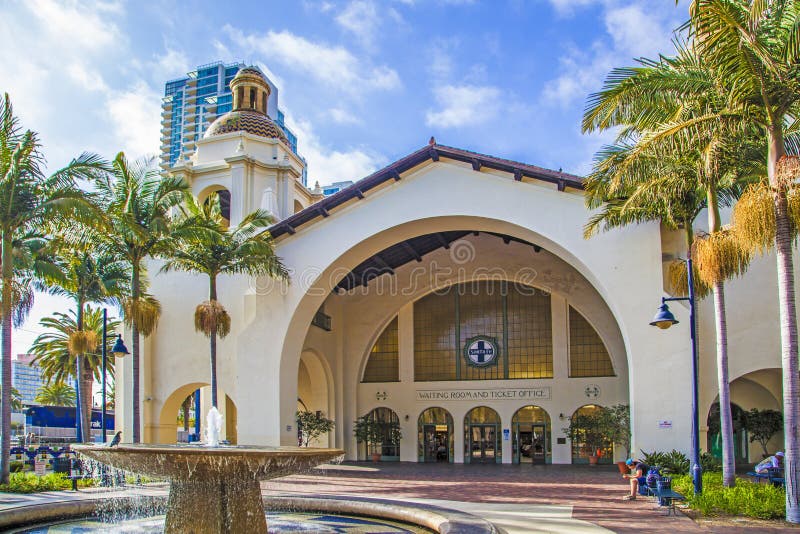 SAN DIEGO, USA - JUNE 11, 2012: famous Union Station in San Diego, USA. The Spanish Colonial Revival style station opened on March 8, 1915 as Santa Fe Depot, california, national, register, historic, places, america, architecture, bench, building, city, classic, district, downtown, facade, gaslamp, house, monument, old, outdoor, palms, people, quarter, sitting, tourist, tower, train, travel, tropical, visitor, waiting, hall. SAN DIEGO, USA - JUNE 11, 2012: famous Union Station in San Diego, USA. The Spanish Colonial Revival style station opened on March 8, 1915 as Santa Fe Depot, california, national, register, historic, places, america, architecture, bench, building, city, classic, district, downtown, facade, gaslamp, house, monument, old, outdoor, palms, people, quarter, sitting, tourist, tower, train, travel, tropical, visitor, waiting, hall