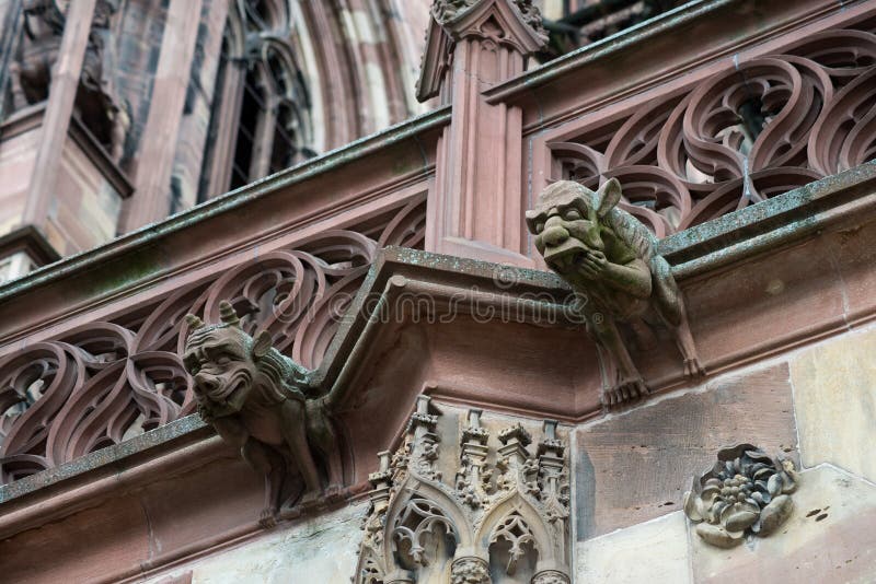 Closeup of stoned gargoyles on cathedral in Strasbourg  - France. Closeup of stoned gargoyles on cathedral in Strasbourg  - France