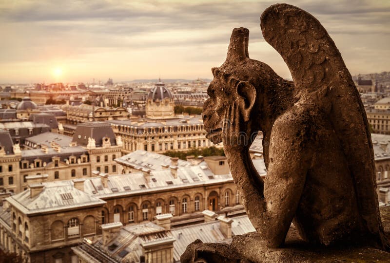 Gargoyle of Cathedral of Notre Dame de Paris overlooking Paris