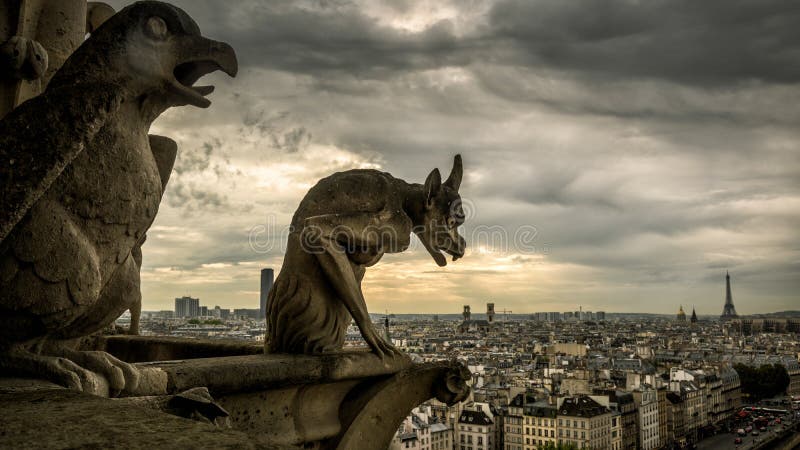 Gargoyles on the Cathedral of Notre Dame de Paris overlooking Pa