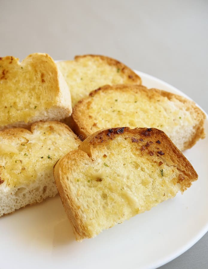 Garlic Bread Slices on White Plate Stock Image Image of bakery