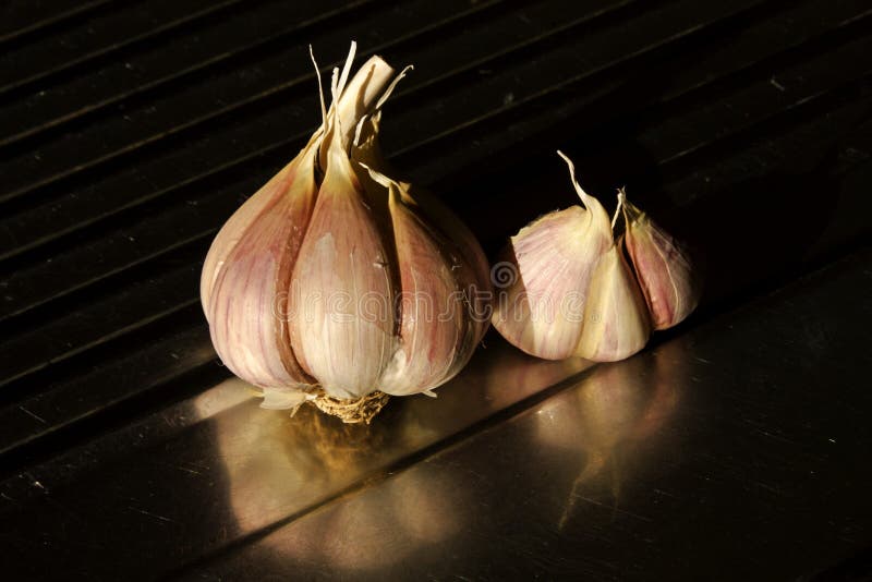 Garlic bulb and cloves stock images Garlic bulb and cloves stock images
