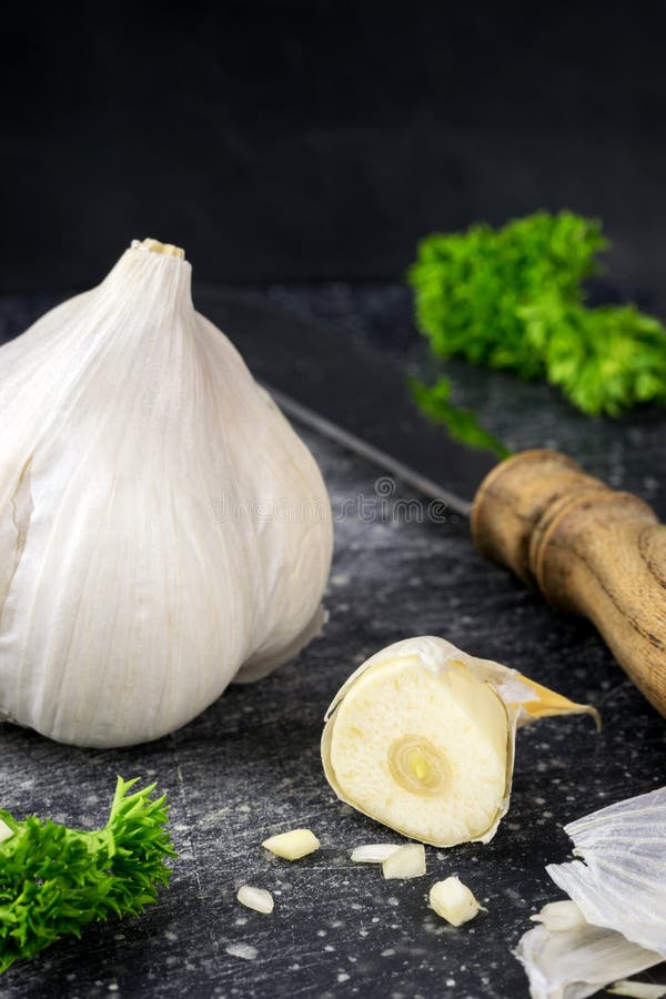 A Garlic Bulb and Sliced Garlic Clove Stock Photo Image of close
