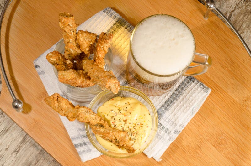 Garlic Cheese Bread Sticks and Cup of Black Tea with Milk Stock Photo