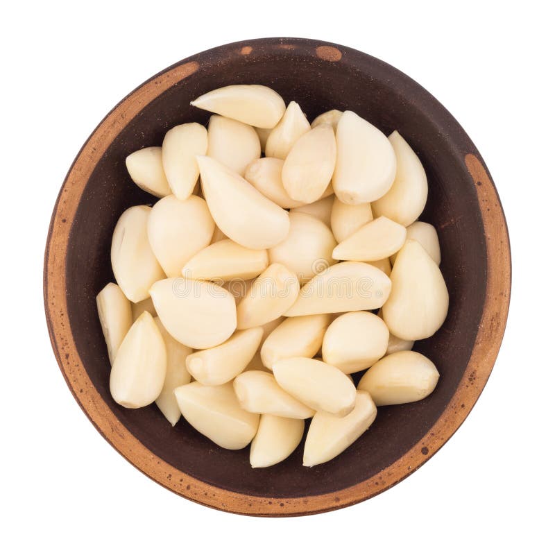 Garlic cloves in bowl from top including clipping path. royalty free stock photography Garlic cloves in bowl from top including clipping path. royalty free stock photography