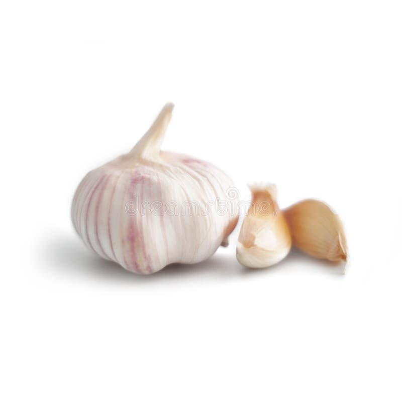 Garlic cloves isolated on white background stock photo